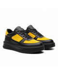 Artemis Solar black and yellow chunky street sneaker by Apollo Moda, third angle