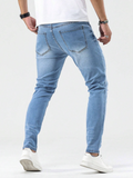 Hommes - Jean skinny en coton déchiré et effiloché