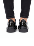 Men's Atlas Eclipse patent all-black sneaker by Apollo Moda, fifth angle